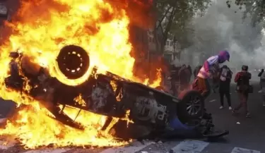 Patrullero incendiado