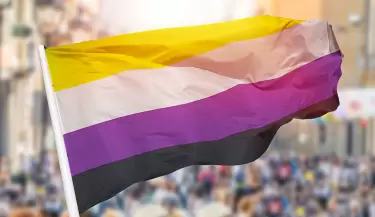 non-binary-pride-flag-blowing-royalty-free-image-1660847409